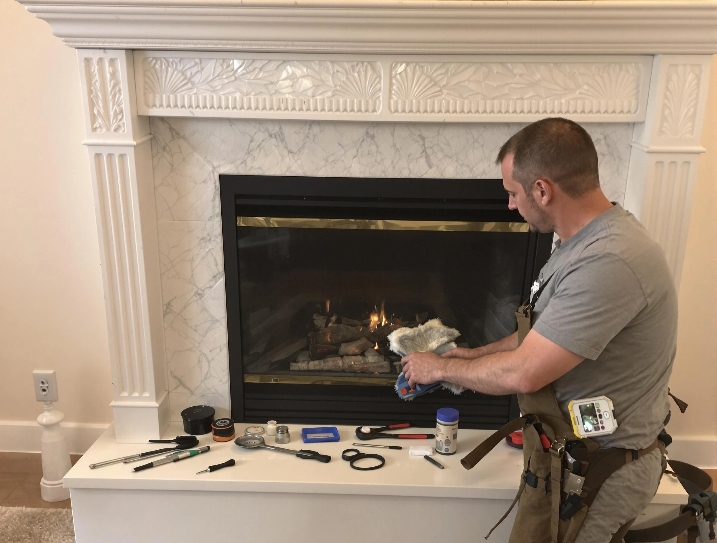 Taunton Chimney Sweep performing fireplace maintenance in Taunton, MA